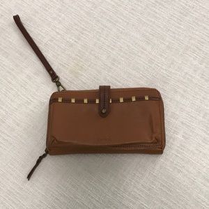 Brown leather clutch